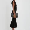 Chain pouch bag in black leather