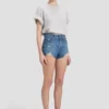 Distressed shorts in mid blue wash