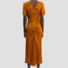 Draped sleeve top in bronze