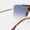 Oversized metal and acetate frame in gold havana